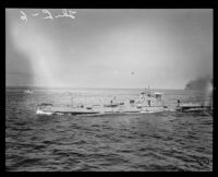 Navy submarine L-6, with the crew on deck in the Los Angeles Harbor, San Pedro, 1919-1925