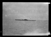 Navy submarine USS Narwhal glides along the surface of the San Pedro harbor, 1932-1933