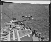 A Navy seaplane is catapulted off the USS Idaho during a military training exercise, San Pedro vicinity, 1932