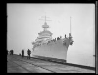 USS Indianapolis at dock while sailors on berth watch, San Pedro, 1933-1939