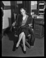 Lillian May Fletcher (actress Billie Whitmore) in court following a hearing related to her divorce, Los Angeles, 1932