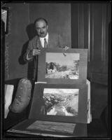 Ernest Volldehr with some of his paintings at the University of California, Los Angeles, 1932