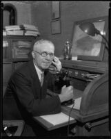Dr. Charles Winsel, Belgian consul, at work, Los Angeles, 1934