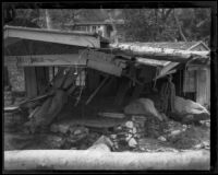 Flood-damaged cabin in Little Santa Anita Canyon, viewed close-up, Sierra Madre, 1926