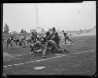 Loyola running back tries to push through the San Francisco defense, Los Angeles, 1932