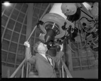 Dr. W. F. Meyer looks through the Griffith Observatory's Zeiss refracting telescope telescope, Los Angeles, 1935