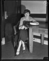 Marjorie Gay is given money in her divorce settlement, Los Angeles, 1934