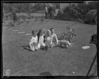 Gettle children sit and pose on their lawn during William F. Gettle's kidnapping ordeal, Beverly Hills, 1934