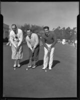 Golfer Olin Dutra with two others at the Los Angeles Open, 1934