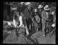 Confessed murderers Koji Hatamoto and Ayako Kanda with detectives at the burial site of Molly Kanda, Torrance, 1932