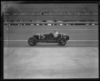 Pete Kreis driving race car number 15 on a race track, 1925-1934