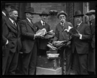 Chamber of commerce members William Lacy, Sylvester Weaver, Frank Wiggins, and R. W. Pridham uncover documents from 1903, Los Angeles, 1924