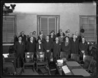 Newly sworn grand jury with Dep. Dist.-Atty. Eugene Blalock, and members O. G. Mechem, Gertrude R. Rose, Alfred T. Schaber, Leonard P. Eeles, Jean McGee, George Rochester, E. Clair Overholtzer, Oliver E. Burns, John Bodkin, Charles A. Meyers, Leland Ford, M. B. Patton, C. P. Wright, Frank J. Rice, Rex Keller, Hector J. Holmes, Florence I. Dodge, William Charles Luther, and Dr. John A. Schwamm, Los Angeles, 1935