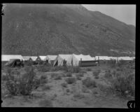 Tents line a camp for workers repairing the Los Angeles Aqueduct in No-Name Canyon, Inyo County vicinity, [about 1927]