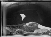 Close-up view of a blast-hole in a Los Angeles Aqueduct feeder pipe, Inyo County vicinity, [about 1927]