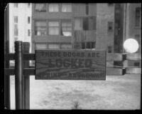 Locked doors sign in the unfinished California State Building in downtown Los Angeles, early 1930s