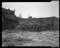 Deserted structure behind commercial buildings in Chinatown, Los Angeles, 1928-1939