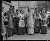 Bishop Robert E. Lucey surrounded by clergy members, Los Angeles, ca. 1932
