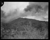 Dark smoke rises over a hill during a brush fire in Griffith Park, Los Angeles, 1929