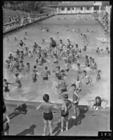 Children swimming in the reopened pool in Griffith Park, Los Angeles, 1934