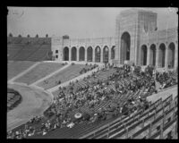 Spectators fill the stands of the Los Angeles Memorial Coliseum during an annual police inspection, Los Angeles, 1927