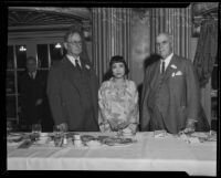 Clarence A. Lyman and Governor James Rolph and an unidentified woman at a banquet, Los Angeles, 1931