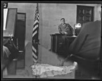 Man with glasses on witness stand during Paul Kelly trial, Los Angeles, 1927