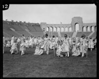 Children enjoy May Day celebrations at the Coliseum, Los Angeles, 1926