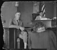 Witness sits on the stand at Aimee Semple McPherson's preliminary hearing, Los Angeles, circa 1926