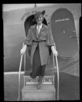 Aimee Semple McPherson deboarding a plane, Los Angeles,