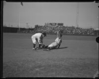 Baseball player Orville Mohler sliding into second base, Los Angeles, 1933-1939