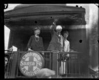 Dr. L. W. Munhall, Mary Munhall and Aimee Semple McPherson on a train car, Santa Fe Springs, 1924