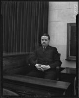 Earl F. Muren sits in a witness box, Los Angeles, 1933