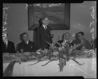 Robert L. McCourt, Daniel C. Roper, and Walter J. Braunschweiger at a banquet, Los Angeles, 1931