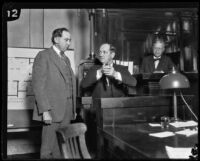 Kid McCoy, defendant, testifies during his murder trial, Los Angeles, 1924