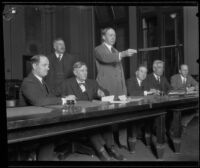 Kid McCoy, his attorneys and District Attorneys appear in court during McCoy's trial, Los Angeles, 1924