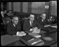 Councilman James S. McKnight sits at the defense counsel's table with his attorneys, Los Angeles, 1933