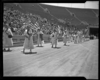 Women march in a Memorial Day parade at the Coliseum, Los Angeles, 1934