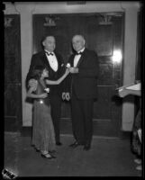 Carlos W. Huntington presents Dortia Echeveste, who gives a flower to Governor Merriam, California, 1934-1938