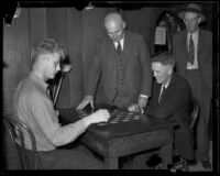 Governor Merriam watching a game of checkers, California, 1934-1939