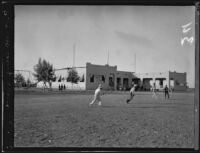 Children playing outside a school in the Progreso colony in Mexicali, B.C., Mexico, 1927
