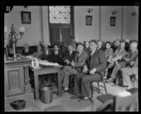 Gordon S. Northcott sits at the counsel's table with his defense attorneys, Riverside, circa 1929