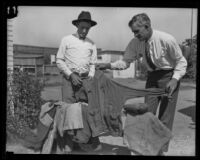 Investigators find a jacket while searching for evidence at a ranch visited by Gordon Northcott, Santa Clarita, circa 1928