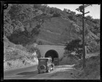 Cars driving through Newhall Tunnel, Los Angeles County, 1928