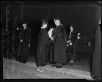 Student receving diploma at Occidental College commencement ceremony, Los Angeles, 1933