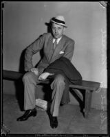 Edward J. "Spike" O'Donnell, Chicago beer runner, sitting on a bench, Los Angeles, 1934