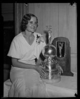 Pilot Gladys O'Donnell with Aerol Trophy, [Los Angeles?], [1932?]