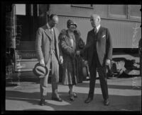 Sidney Olcott, Lillie Hayworth and J. Boyce Smith in front of a train, Los Angeles, 1920-1939