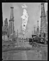 Oil well fire, Santa Fe Springs, 1928