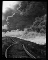 Clouds of smoke from an oil well fire, Santa Fe Springs, 1929